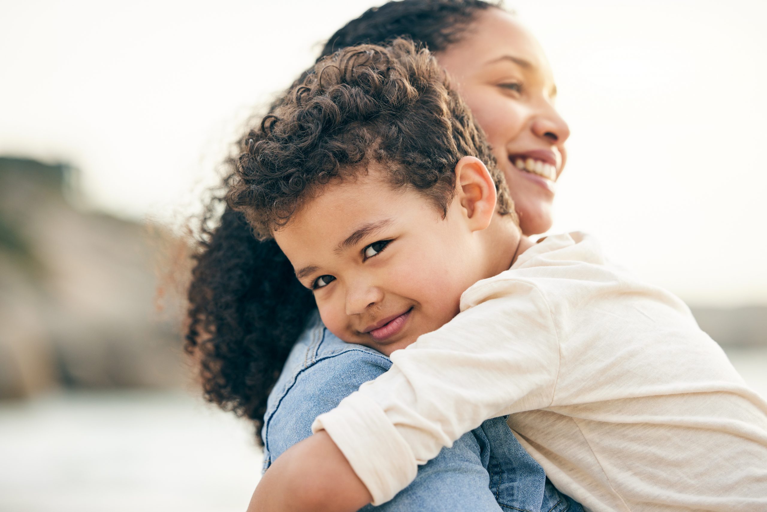 Hug,,Portrait,And,A,Mother,And,Child,At,The,Beach